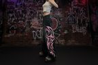 Pink Flames distressed baggy jeans